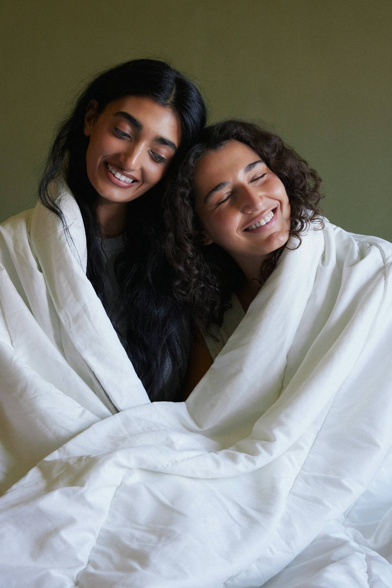 Two girls smiling